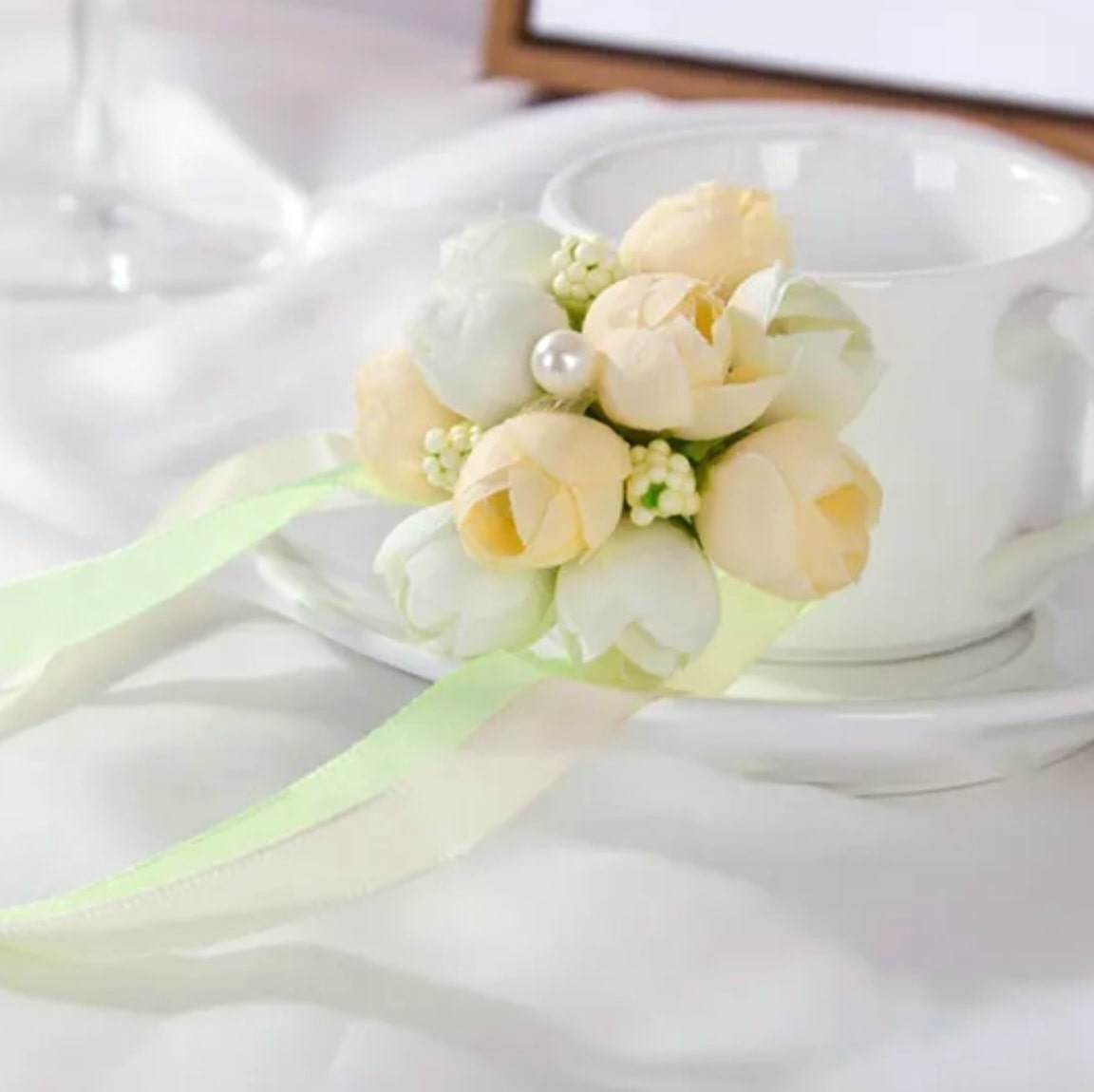 Elegant bridesmaid wrist corsage made with a flower bouquet