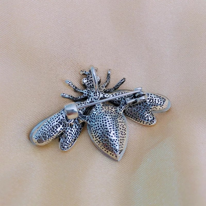 irresistible charm of the crystal champagne bee brooch