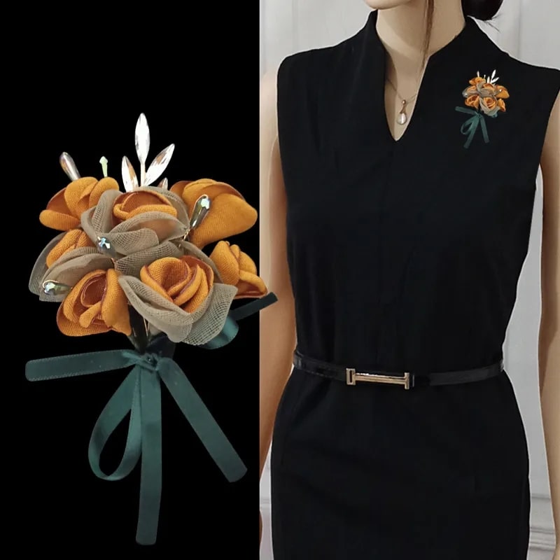 Experience the cozy allure of this mustard silk yarn flower brooch corsage on black dress for women, a blend of simplicity and sophistication