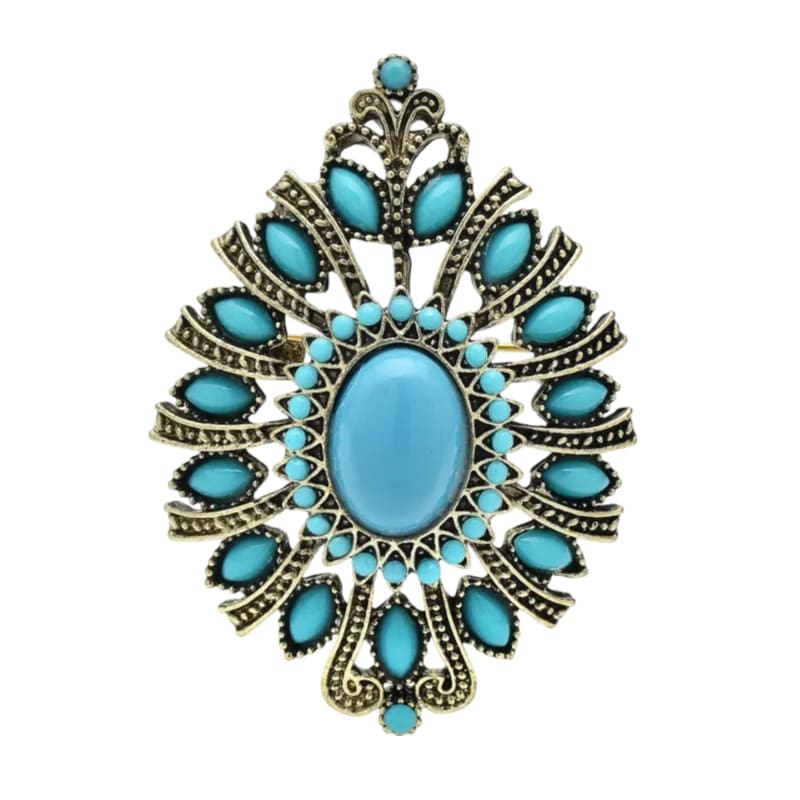 Vintage Blue Resin-Stone Brooch with intricate gold details, reminiscent of a clear blue sky and flowing river