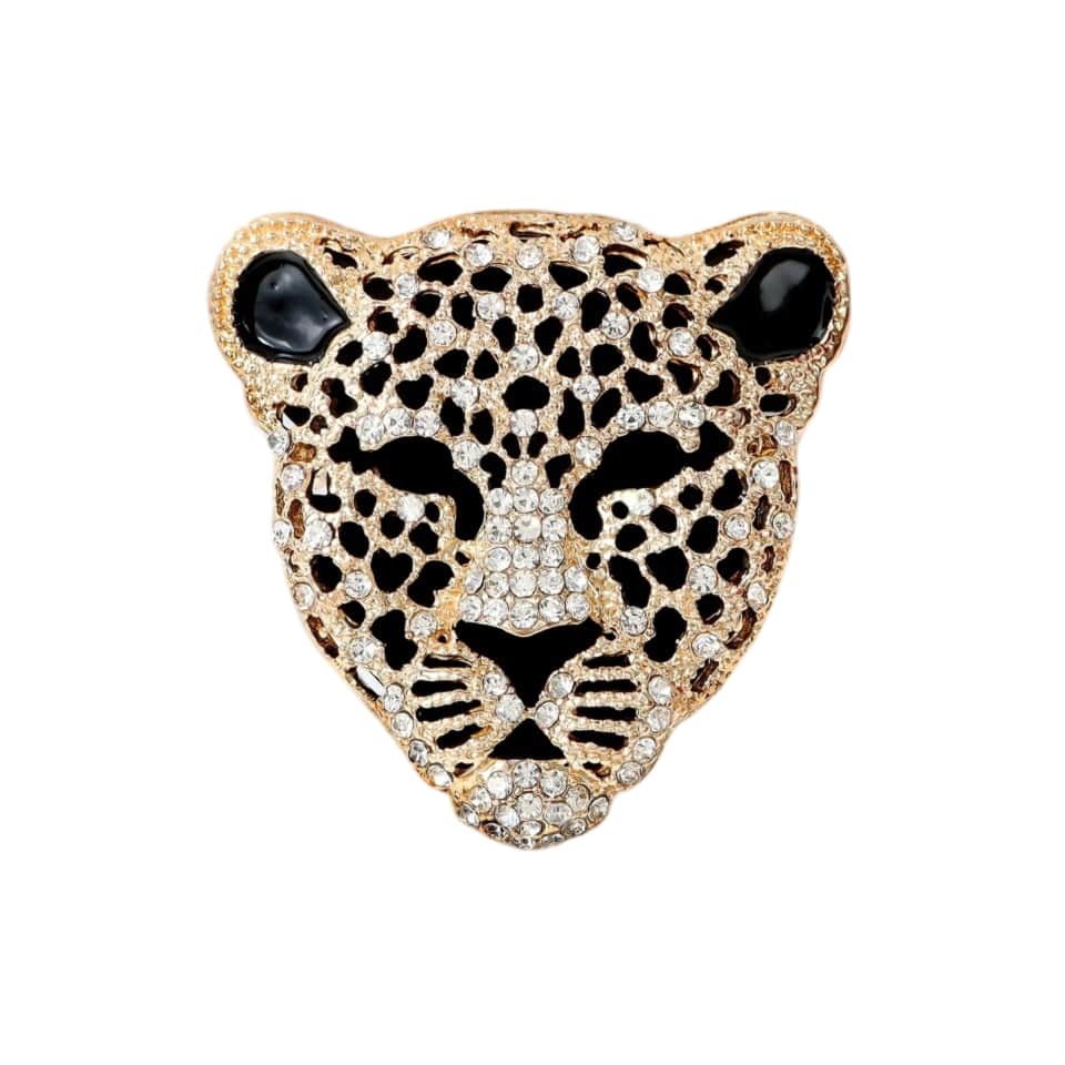a leopard head brooch with diamond accents