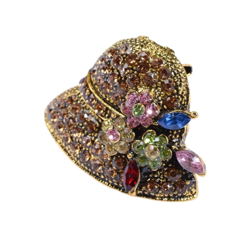 A vintage hat with colourful flowers and crystals is a valuable accessory that provides a vintage touch to any ensemble.