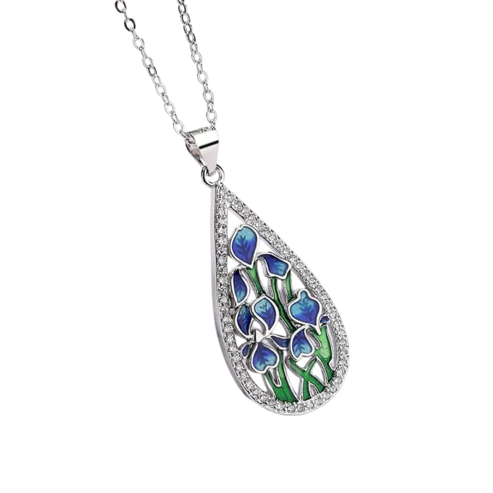 Make a statement with our Handmade Enamel Zirconia Silver Necklace, boasting a tear-shaped pendant with diamond and emerald