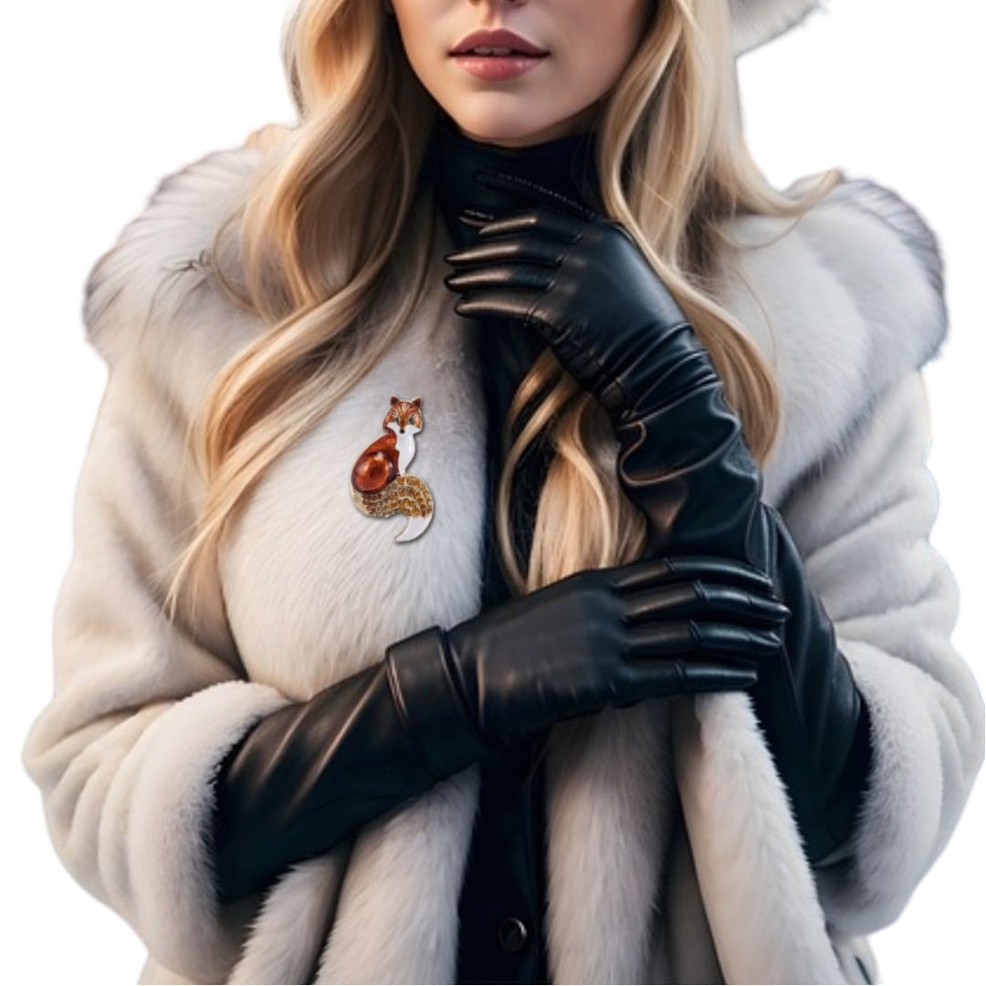a woman wearing a fur coat and gloves, showcasing the rhinestone fox brooch