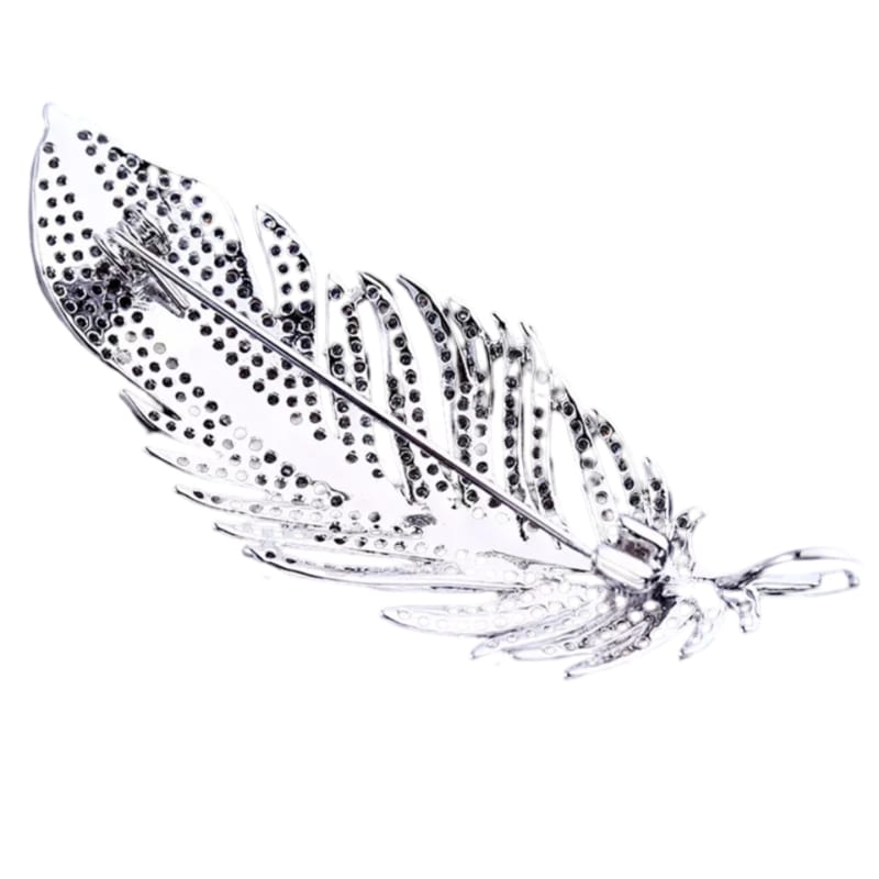 The Luxury Zirconia Feather Brooch, inlaid with countless small rhinestones, exudes elegance and class on a white background