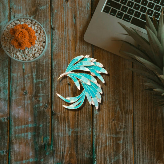 Classic Intricate Leaves Brooch on top of table