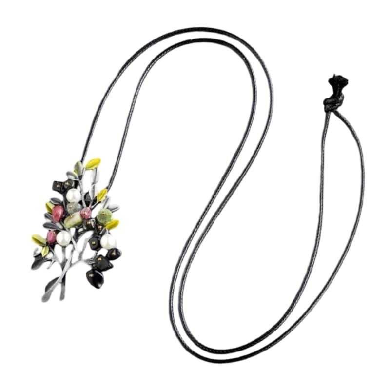 Necklace with flower and leaf design, resembling a blooming tree. Features pearls and stones