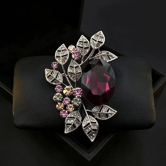 luxurious purple crystal brooch with silver leaves and rhinestones