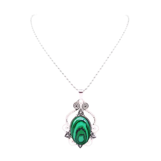 green malachite stone pendant on silver chain, perfect for special gatherings. Timeless elegance and unique design