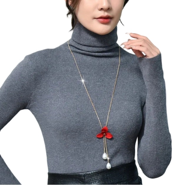 Woman in turtle neck sweater wearing Red Flower Long Chain Necklace, adding a spark to her look with intricate details and glamour