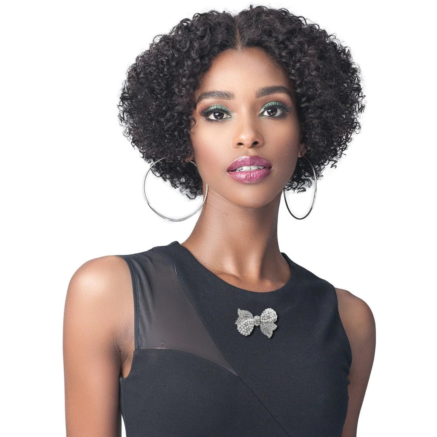 woman in black top and short curly wig, accessorised with sparkling rhinestone pearl bowknot brooch