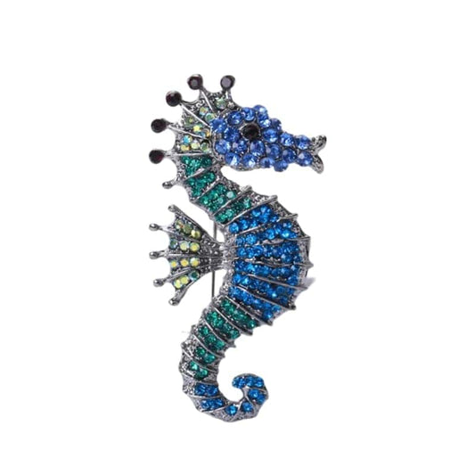 stunning seahorse brooch adorned with blue green and red crystals