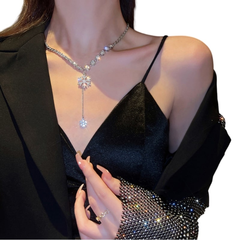 lady in black dress and jacket accessorised with Sparkling Rhinestones Snowflakes Necklace