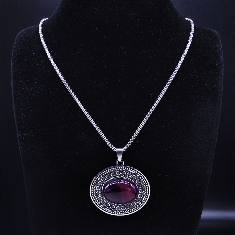 Stand out with our Purple Stone Stainless Steel Necklace, featuring a beautiful purple stone on an intricately designed pendant.