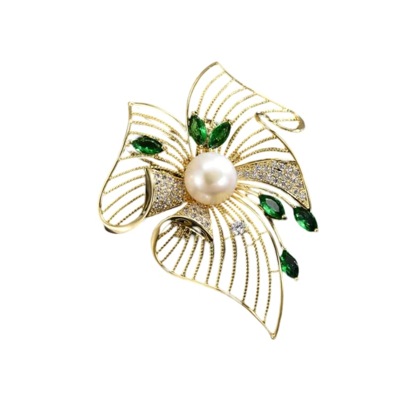 beautiful crystal brooch with hollow leaves adorned with rhinestones, pearl, emerald leaves, and golden